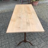 Bistro table with cast iron base