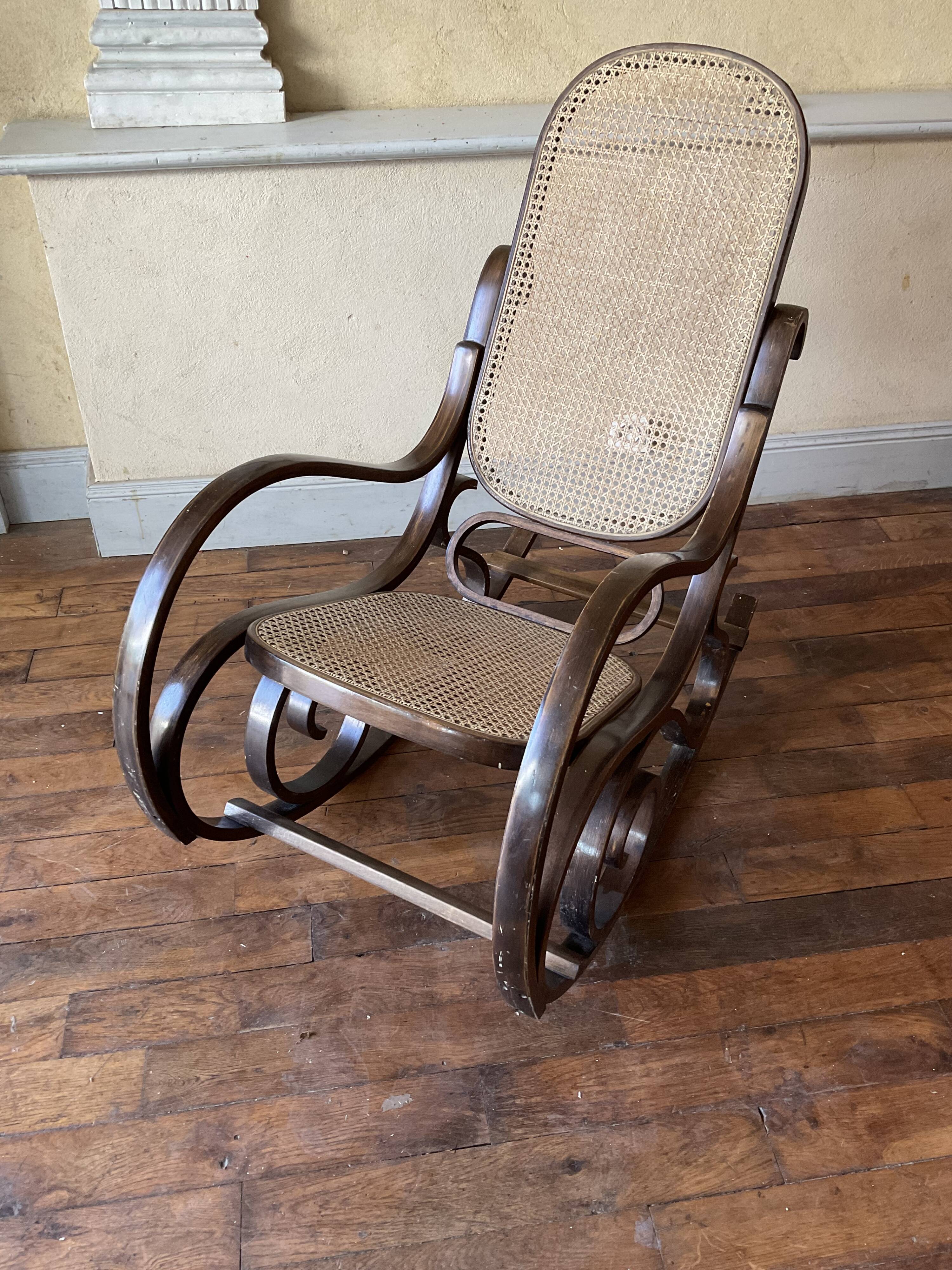 Vintage rocking chair in curved wood