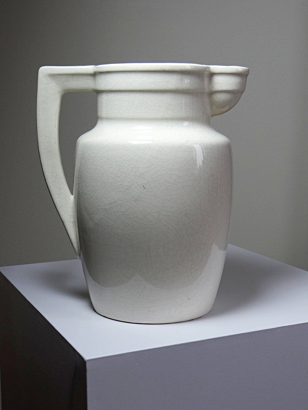 Large Art Deco toilet bowl, antique cracked faience.