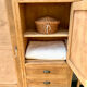 Asymmetrical wardrobe in raw wood