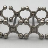 Set of 6 old table knife resistors in the shape of crossbars in silver metal