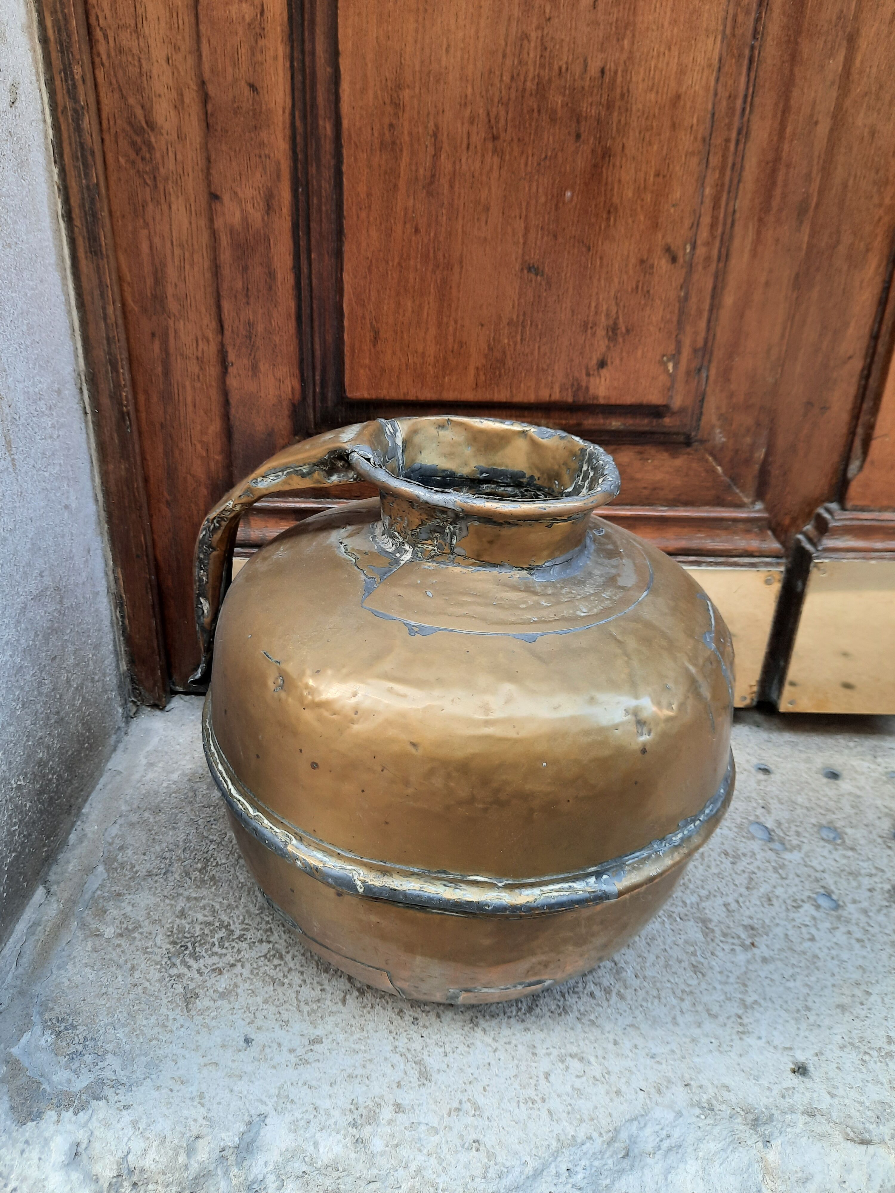 Antique brass jar