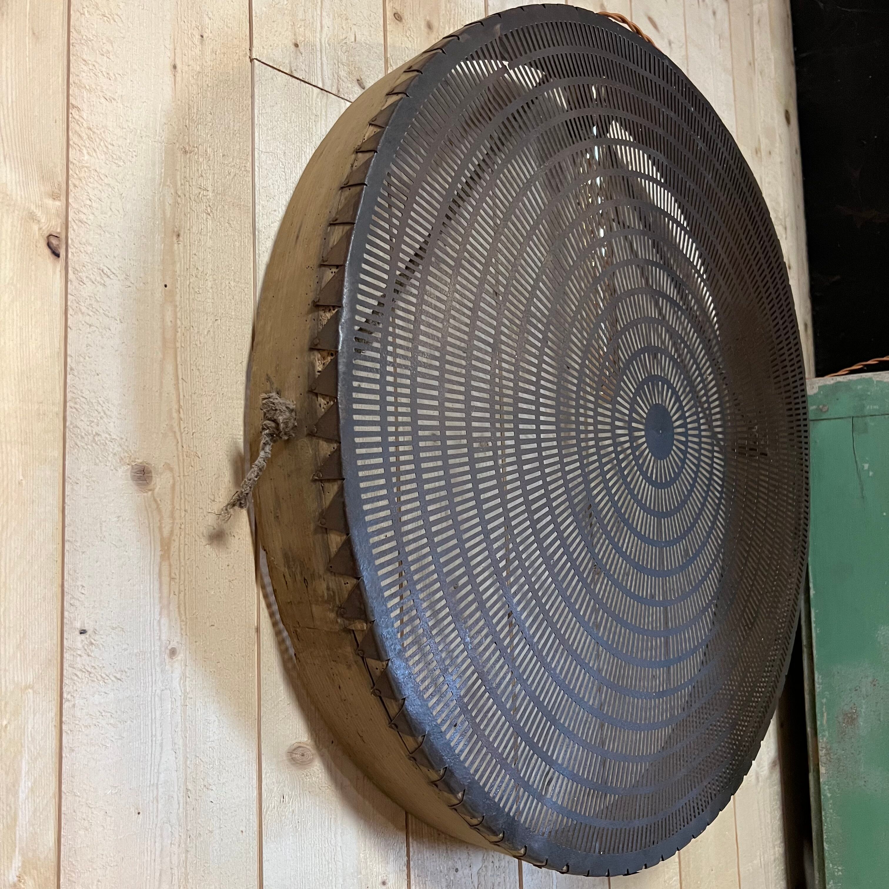 Old lamp in wood and metal worked with integrated lamp.