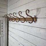 Curved wooden coat rack with 6 hooks