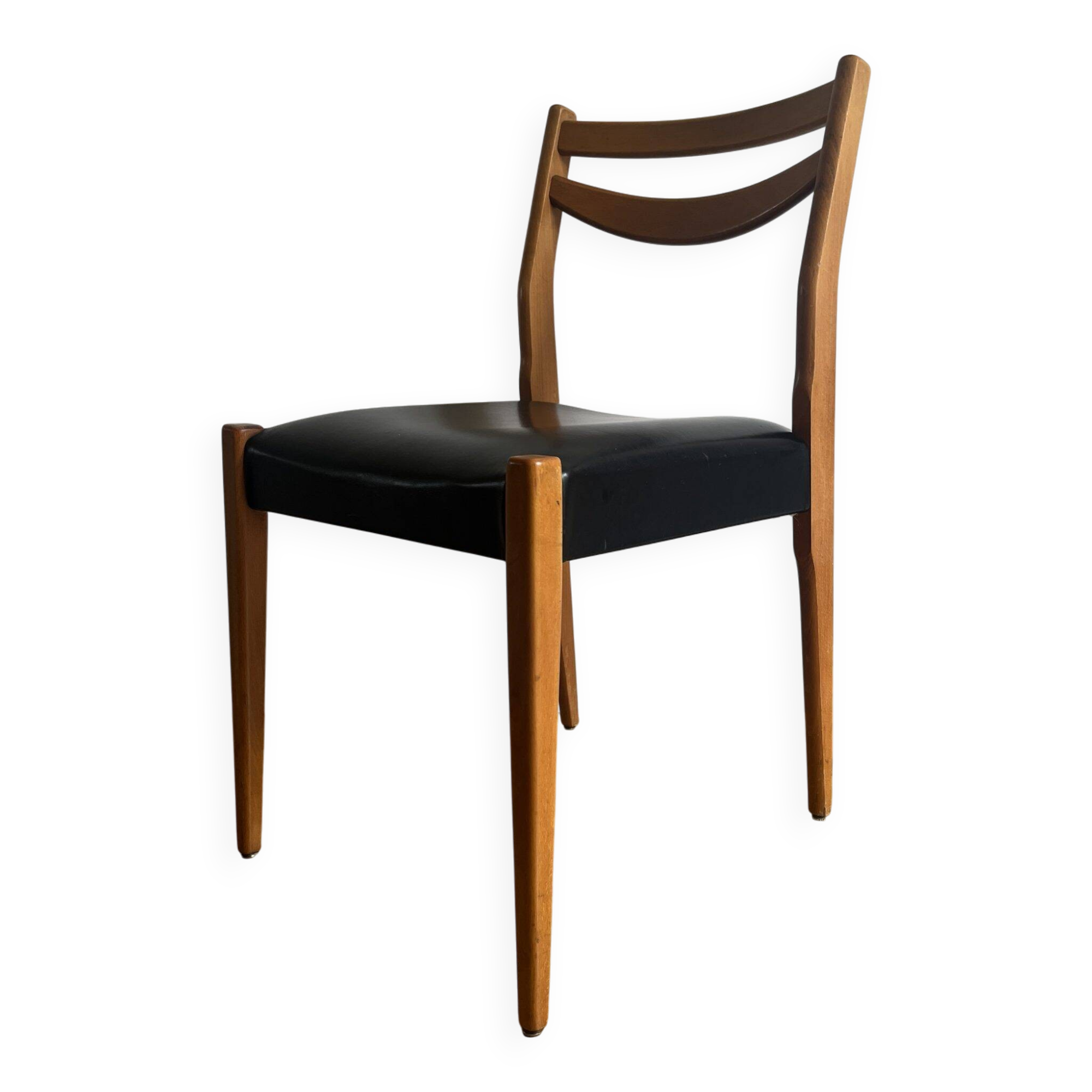 Vintage chair in wood and black leatherette