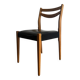 Vintage chair in wood and black leatherette