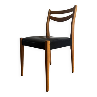 Vintage chair in wood and black leatherette