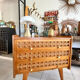 Vintage wooden and rattan chest of drawers with tapered legs.