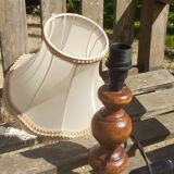 bedside lamp, small turned wooden foot and ecru pagoda lampshade with stripe and fringes