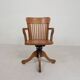 Oak office chair with adjustable spring system and height adjustment, 1950s.