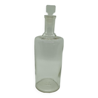 Old apothecary bottle with its stopper