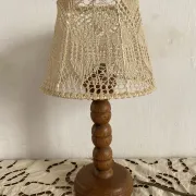 Wooden turned bedside lamp with lace