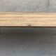 Wooden coffee table with pin legs