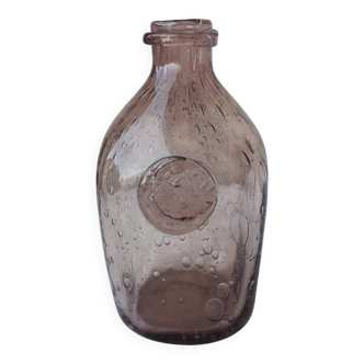 Biot bottle in bubbled glass