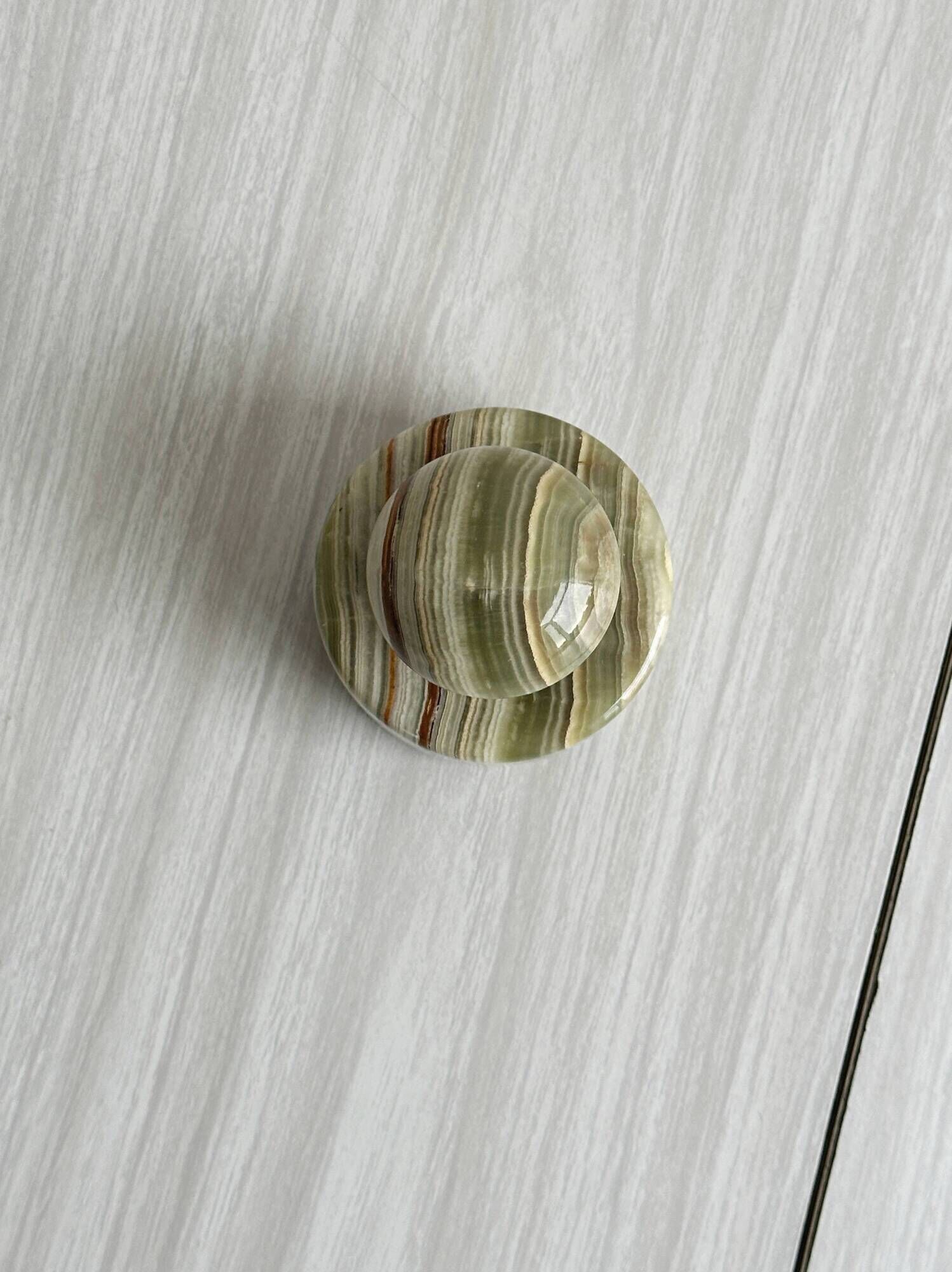 Green veined stone paperweight