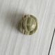 Green veined stone paperweight