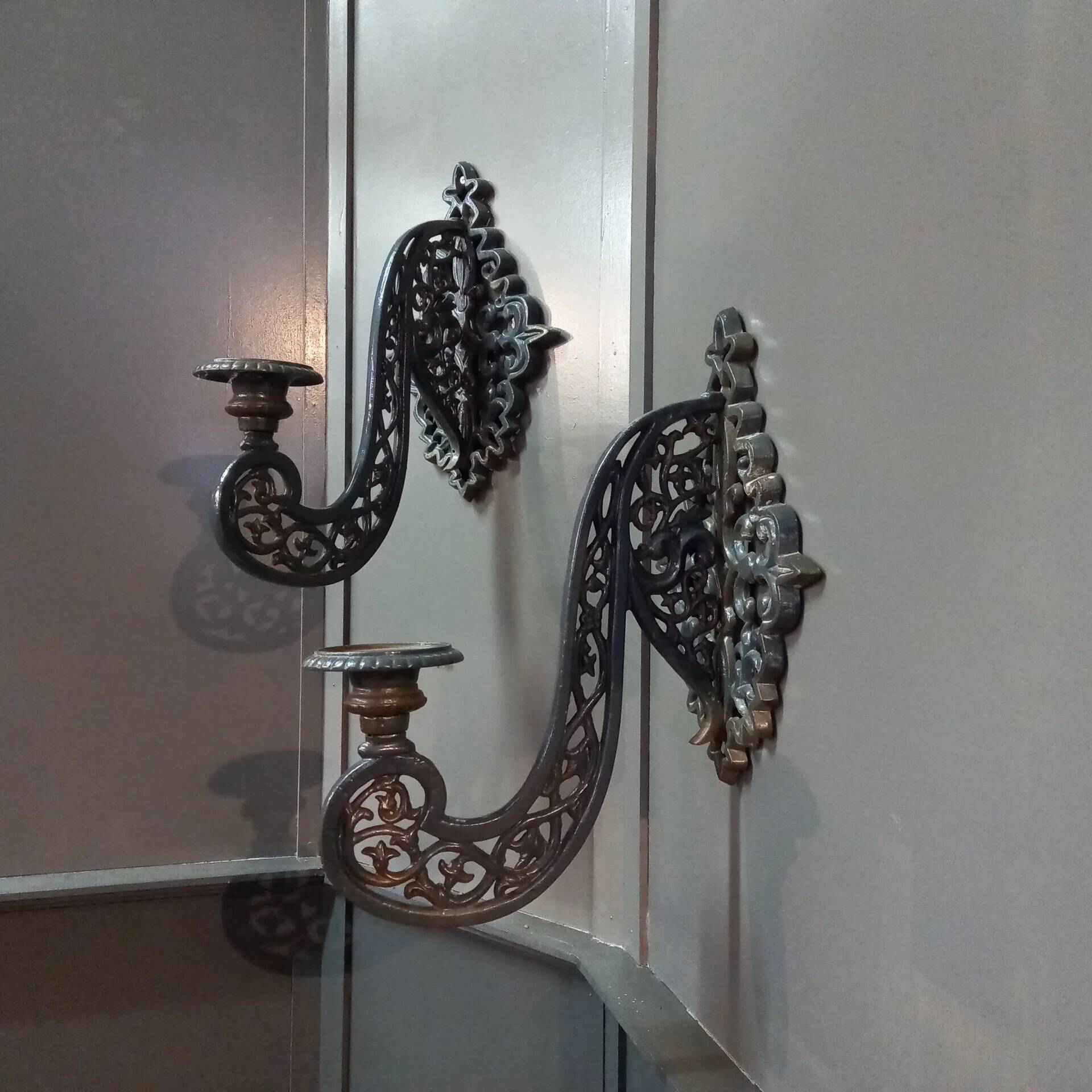 Set of antique neo-Gothic cast iron wall sconces