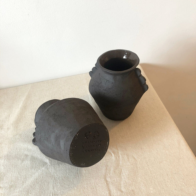 Black ear vase