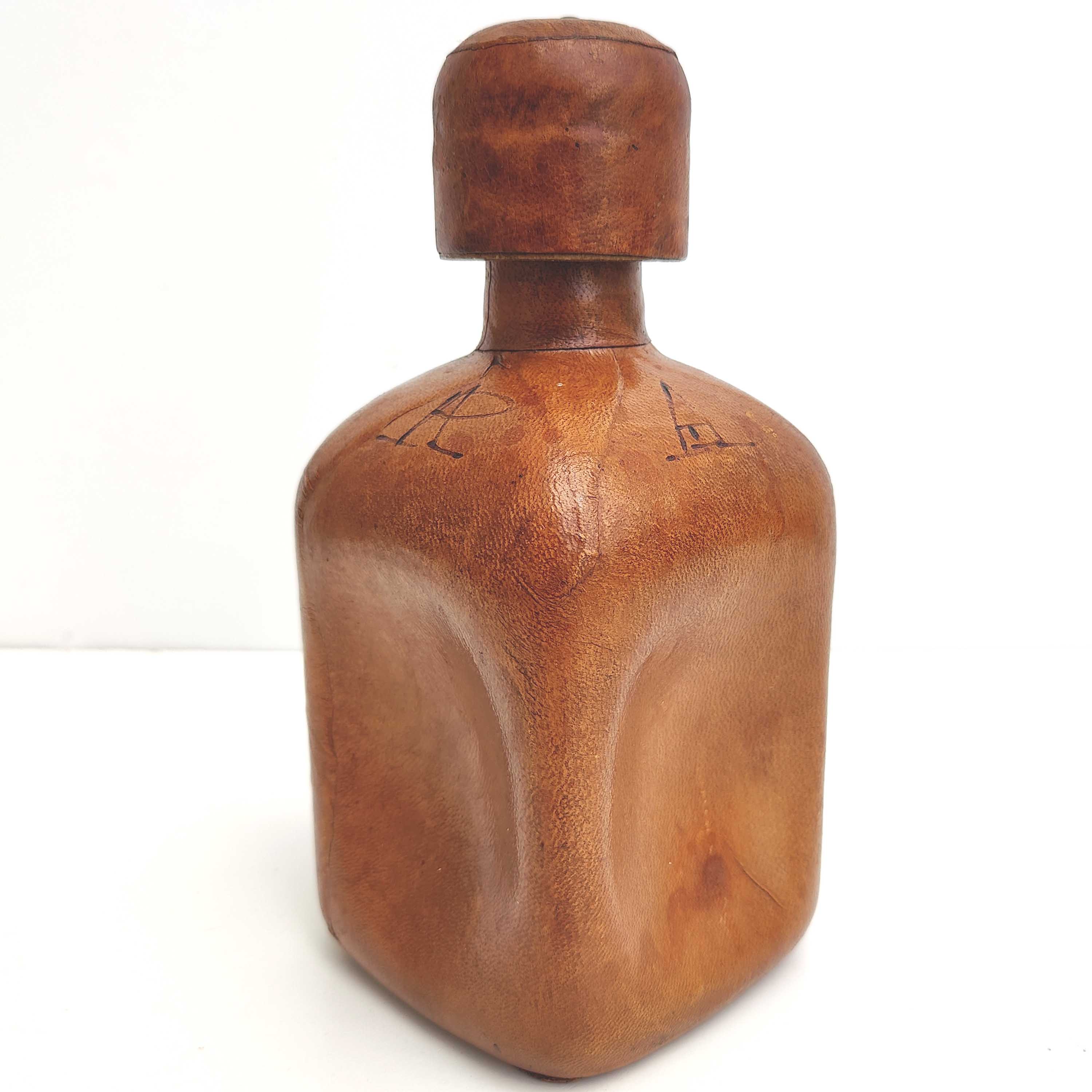 Vintage whisky decanter bottle glass and leather Havana color