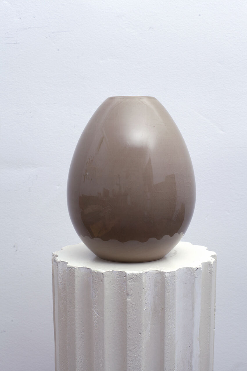Beige ceramic vase egg shape
