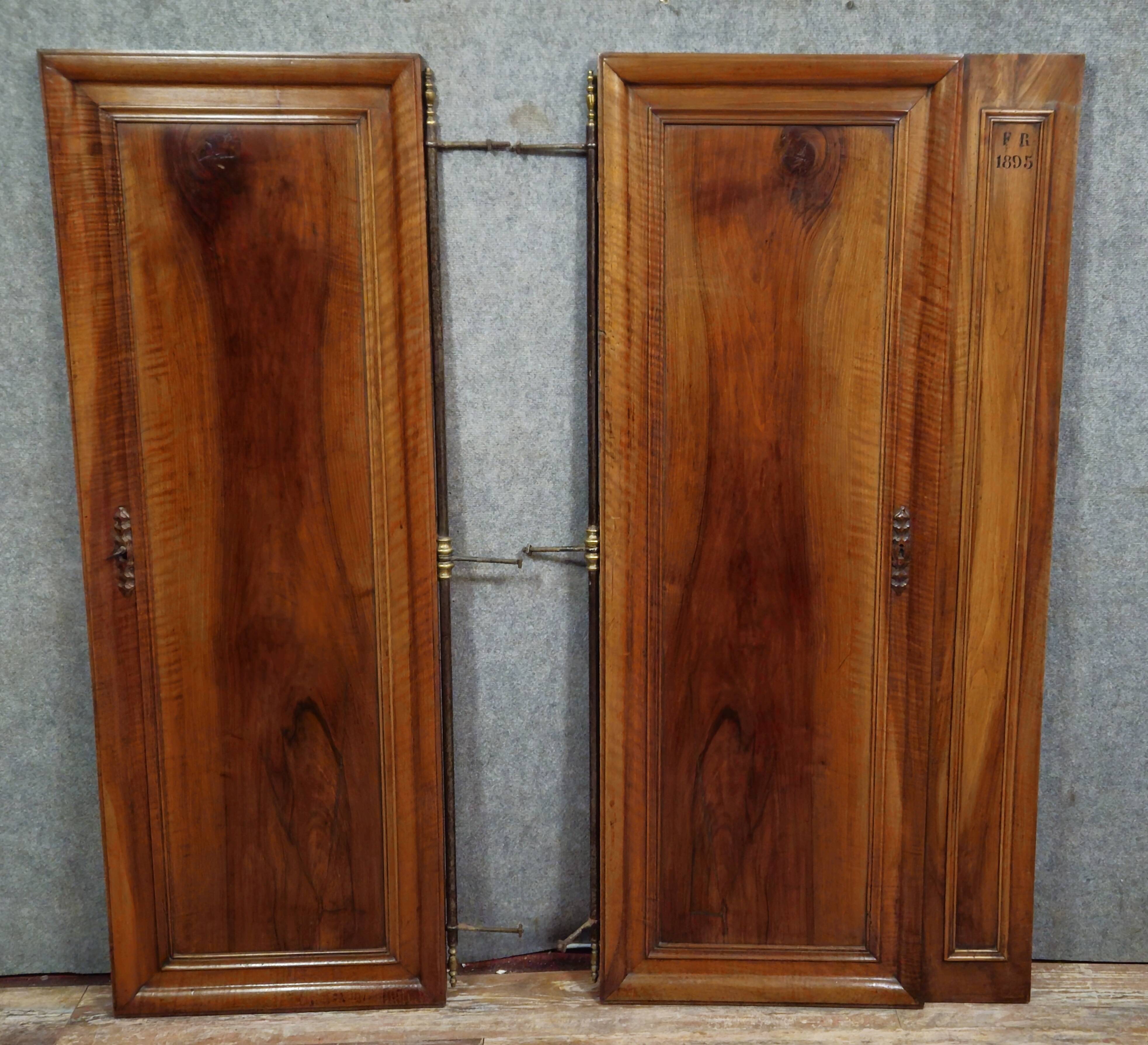 Pair of walnut wardrobe doors, dated 1895 / for cupboard