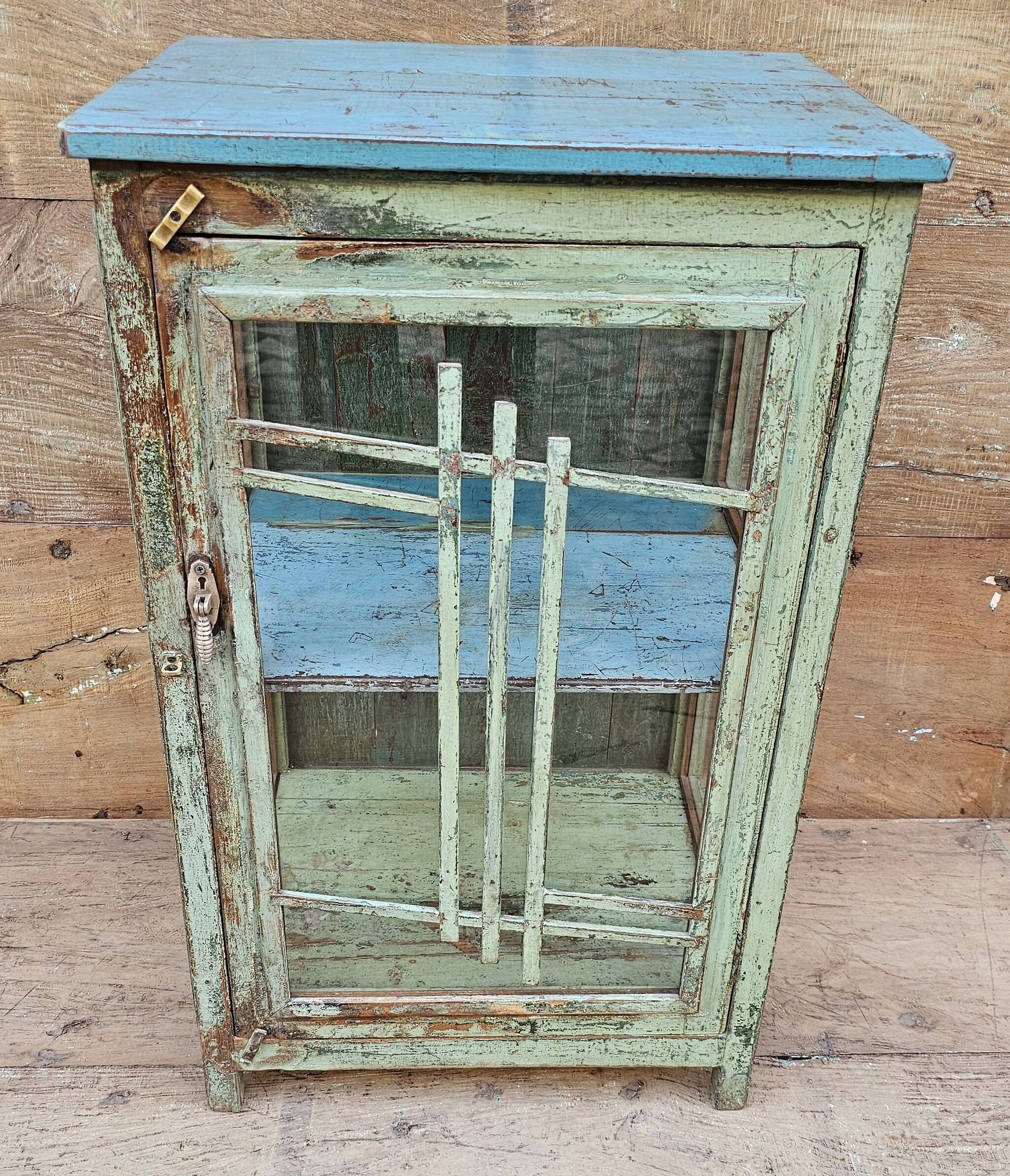 Art Deco glass-fronted bar cabinet in teak