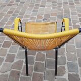 Folding chair in red scoubidou and black metal structure