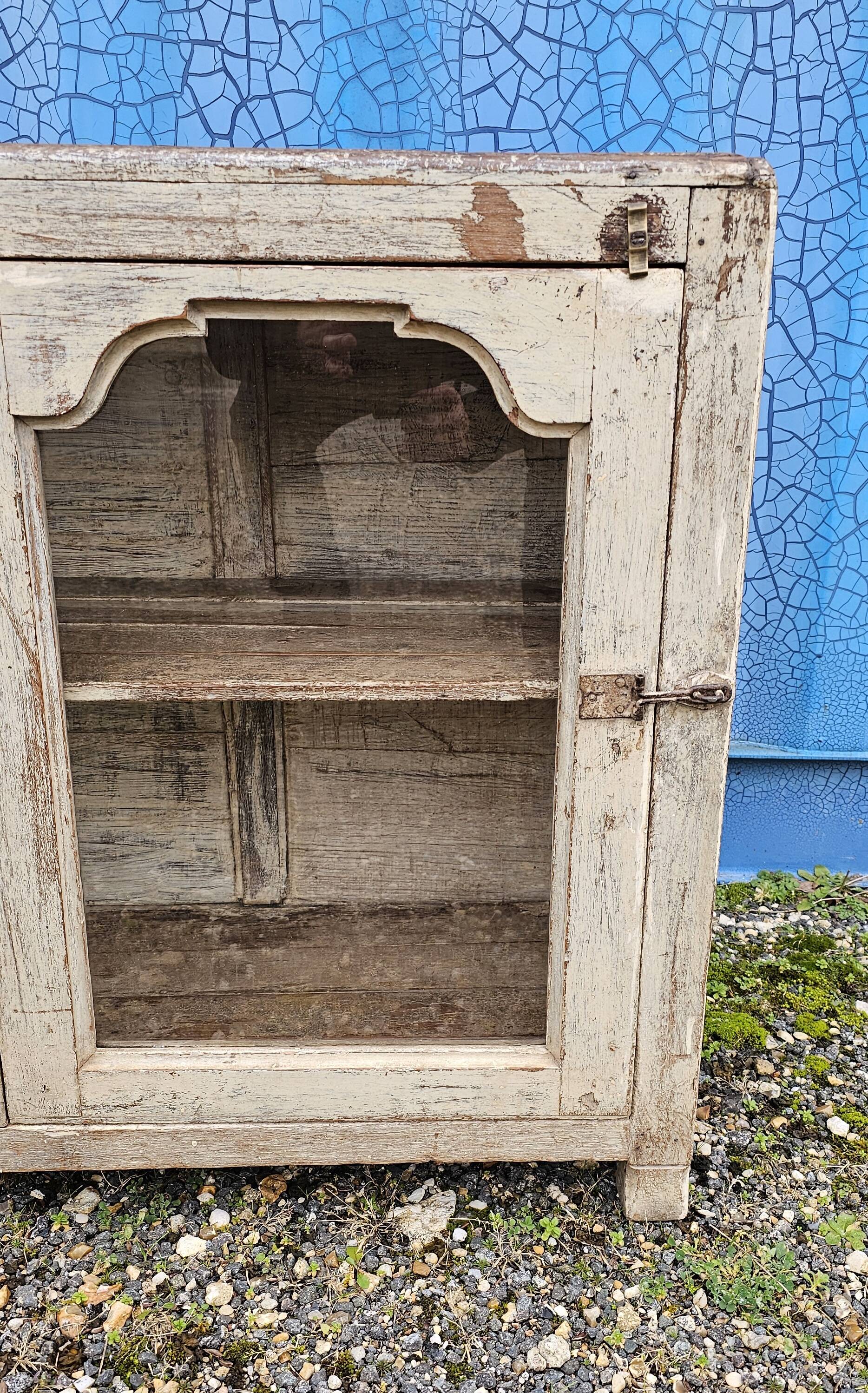 Vintage glass-fronted teak sideboard