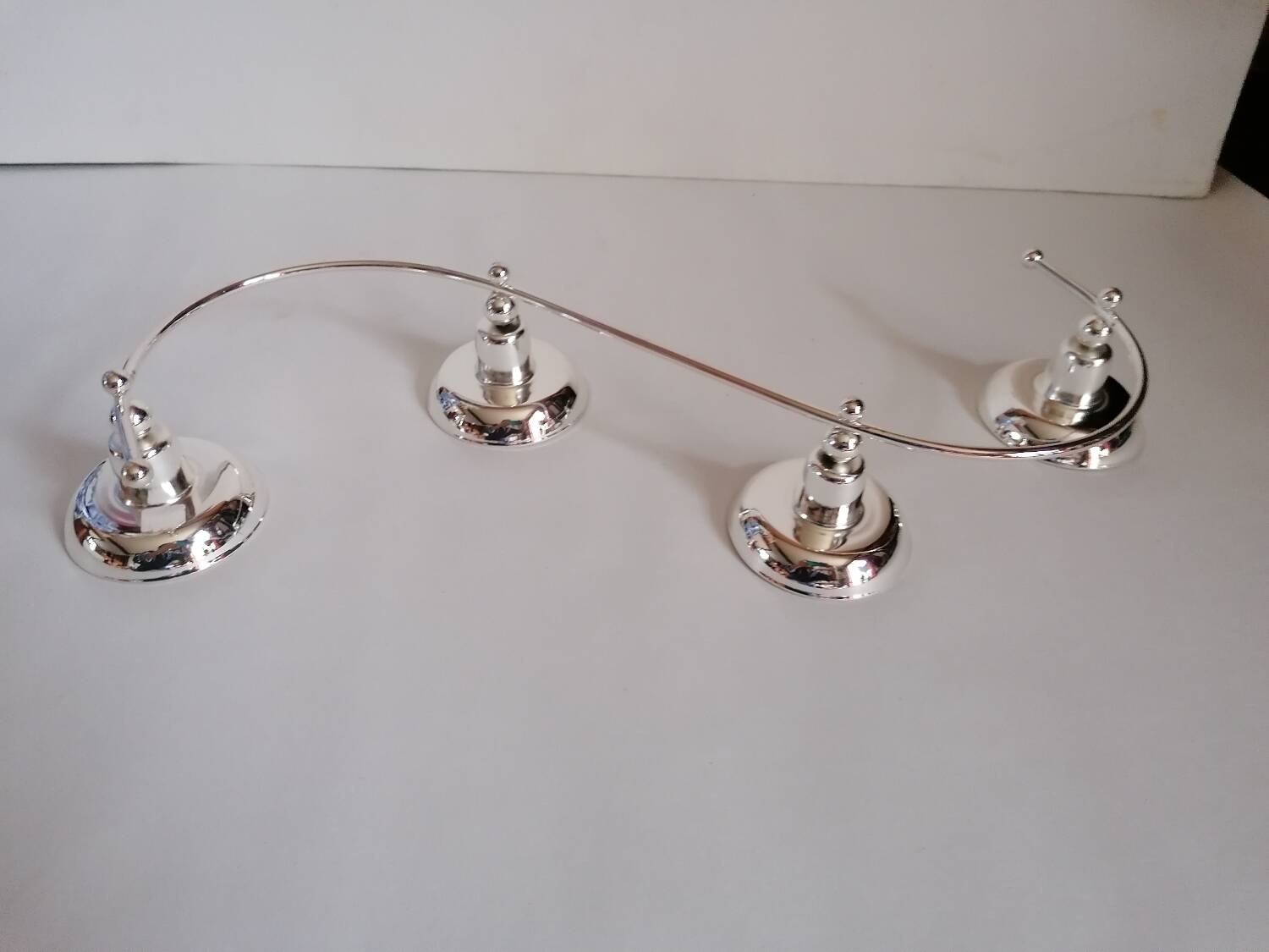 4-light silver metal candle holder