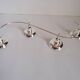 4-light silver metal candle holder