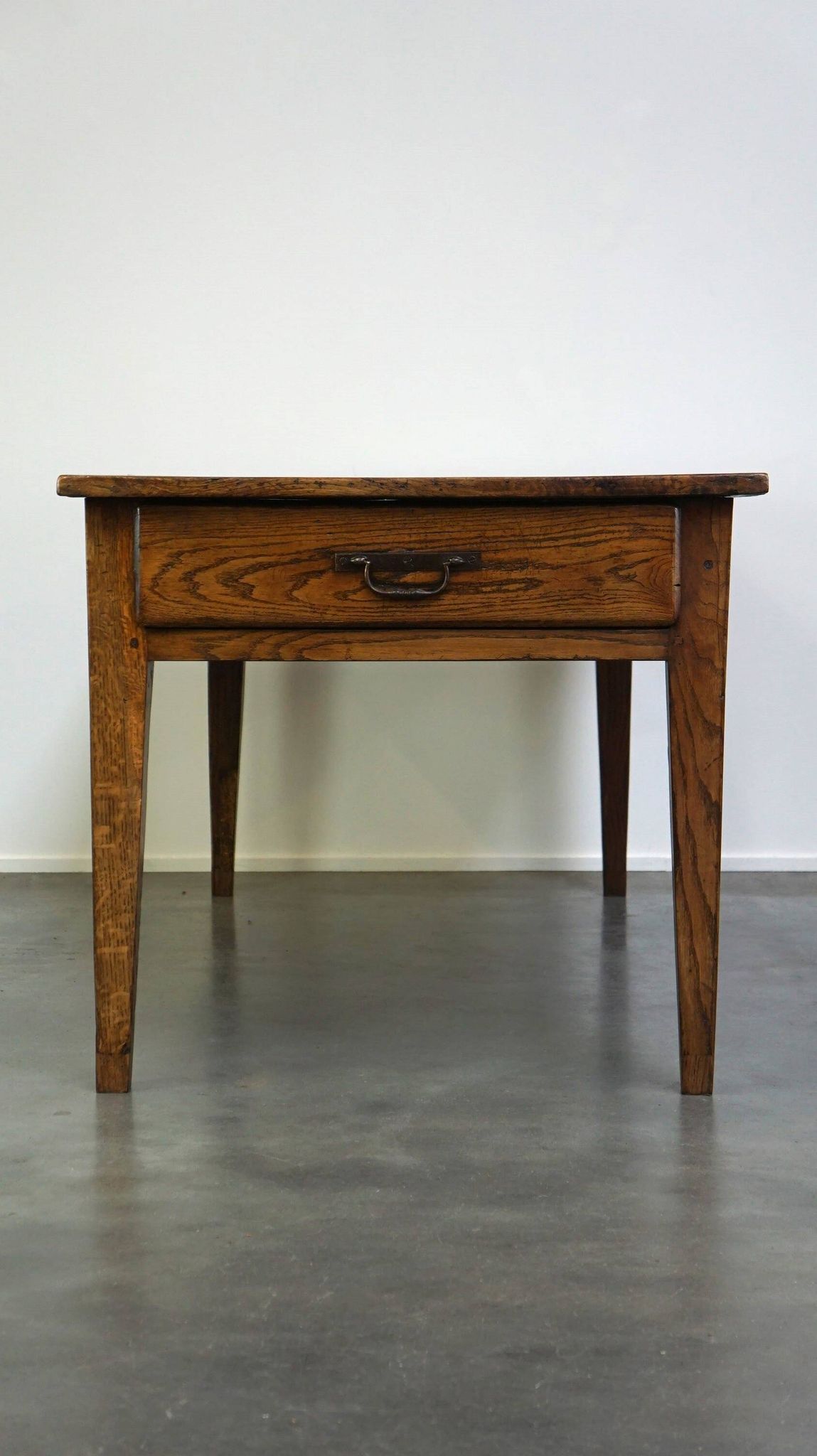 antique French oak dining table with 3 drawers and an exquisite patina
