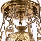 Brass chandelier from the first half of the 20th century.