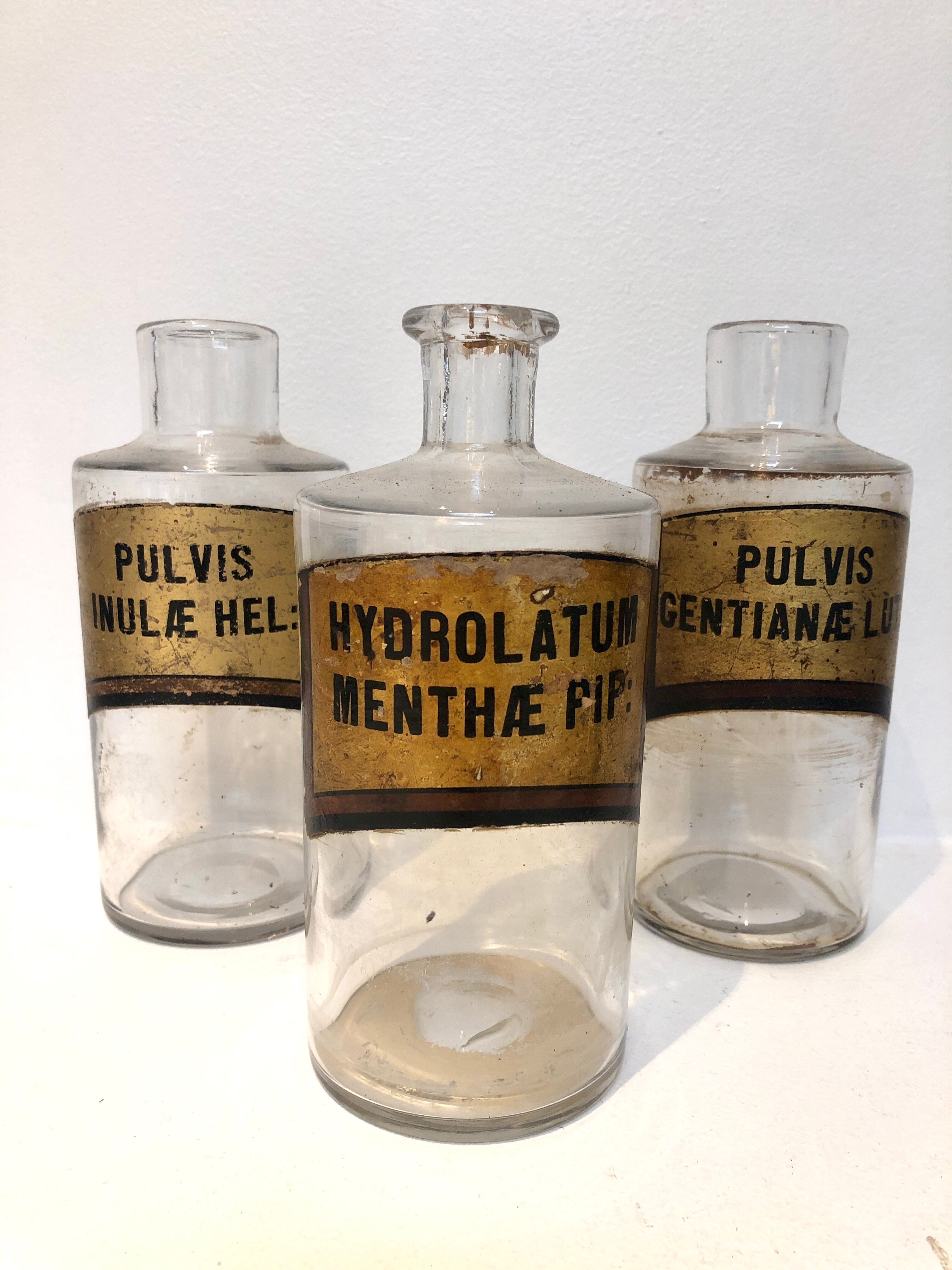 Trio apothecary bottles, early 20th