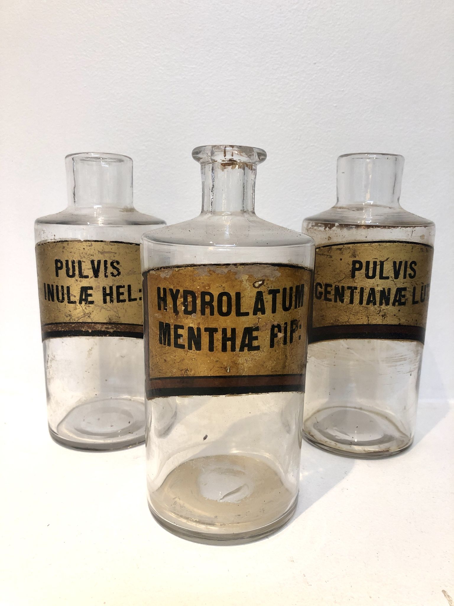 Trio apothecary bottles, early 20th
