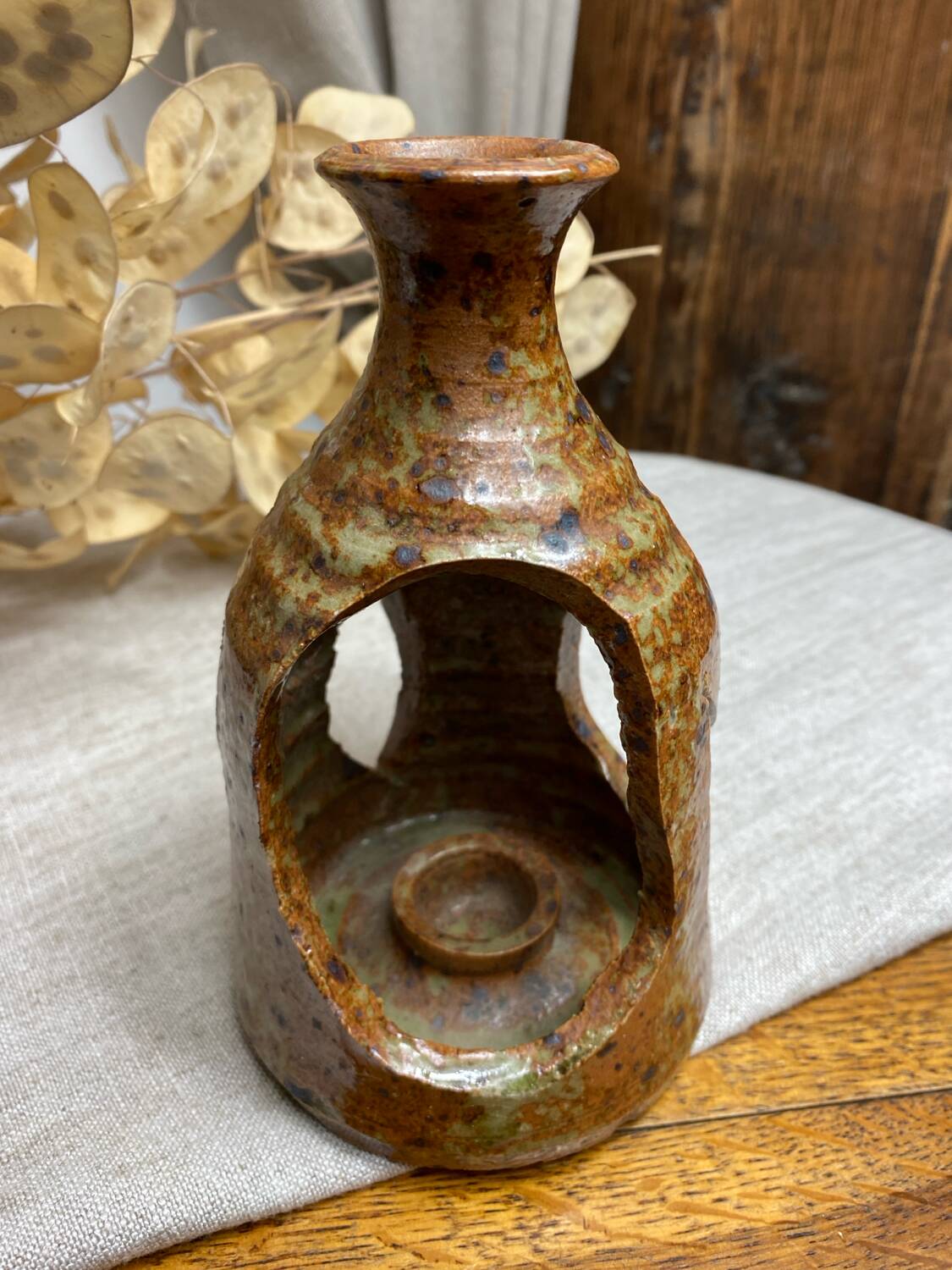 Lantern-style candlestick in pyrite sandstone
