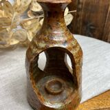 Lantern-style candlestick in pyrite sandstone