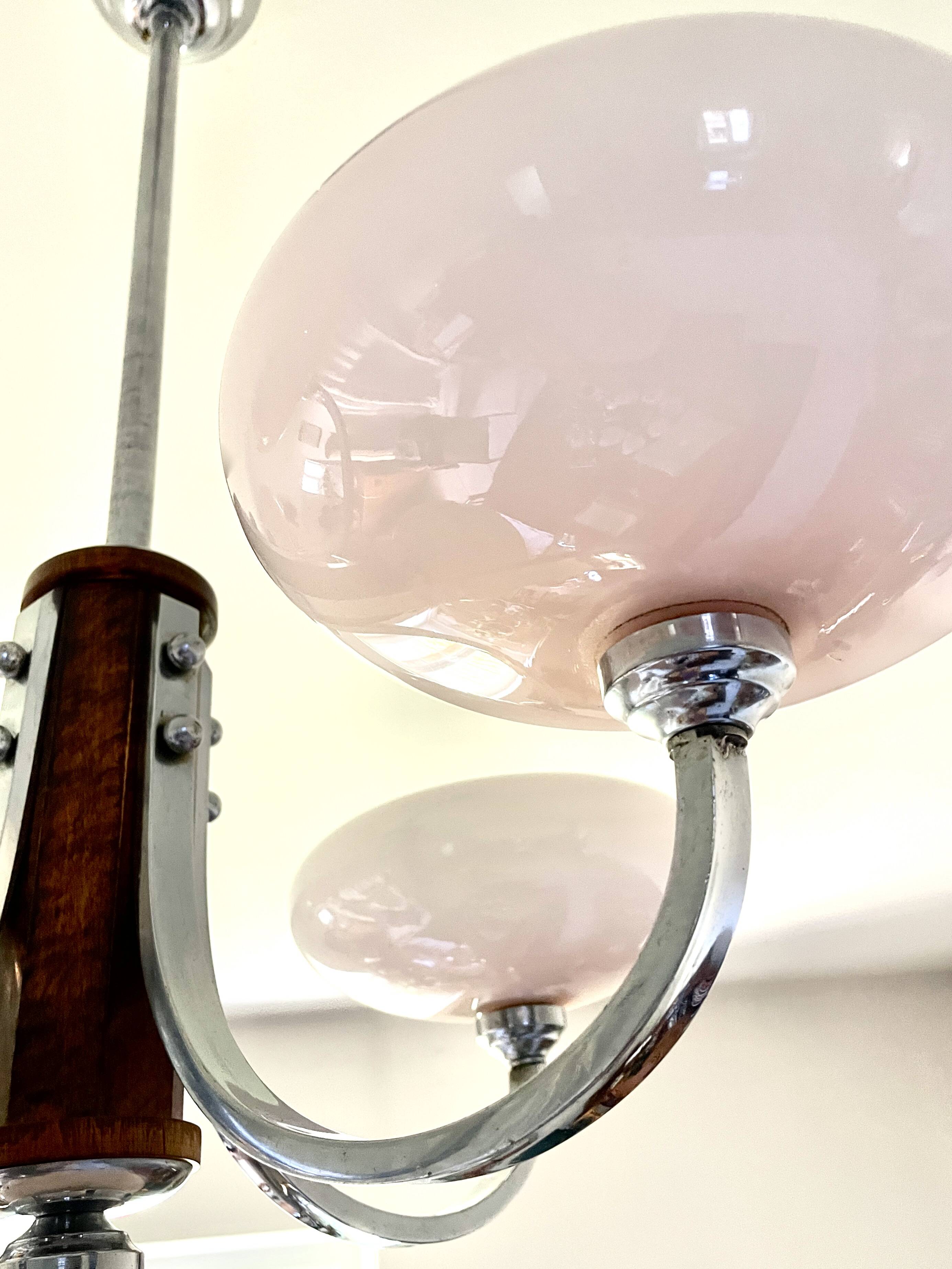 Art Deco lustre with pink glass, wood, and chrome from the 1930s.