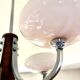 Art Deco lustre with pink glass, wood, and chrome from the 1930s.