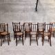 Series of 7 old bar cane cane bistro chairs