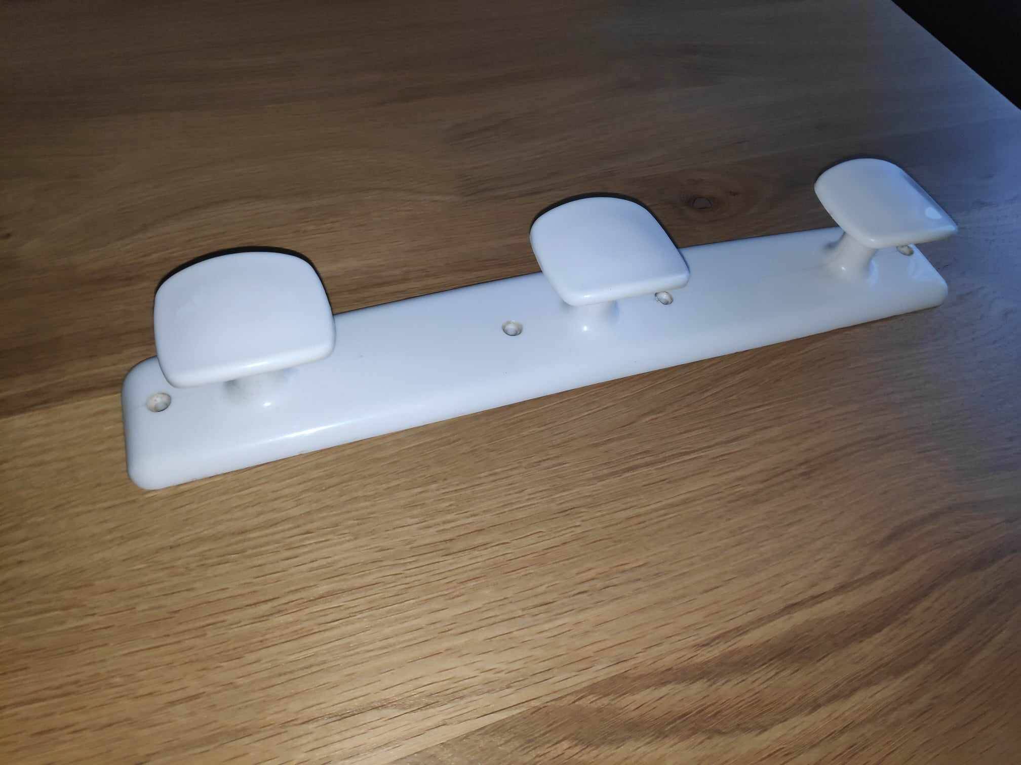 Vintage white plastic coat rack