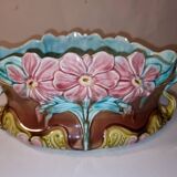 Old barbotine planter with flower patterns
