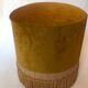 Velvet and fringed ottoman