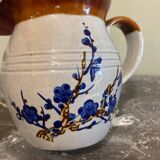 Decorated stoneware carafe