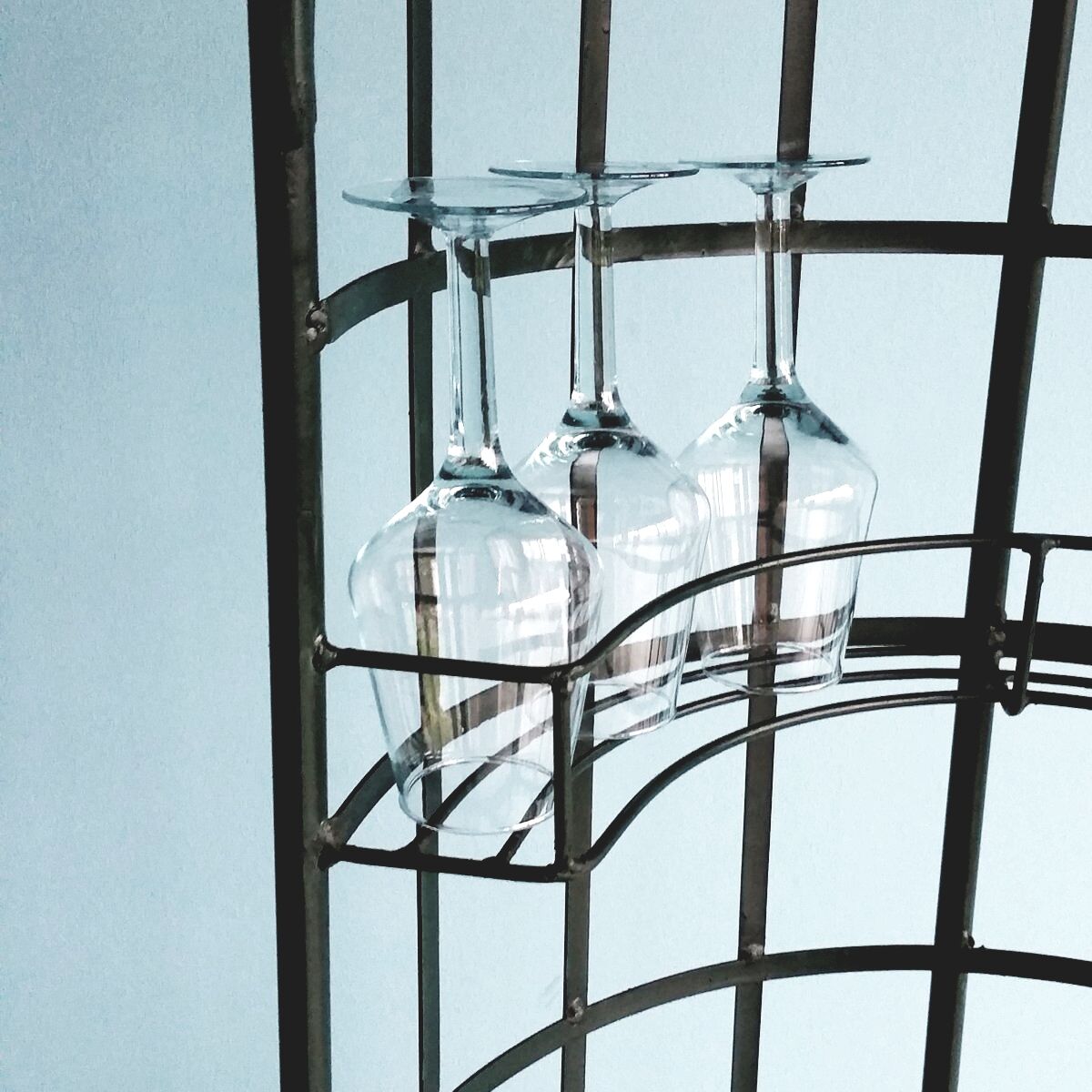 Wrought iron bar with bottles holder