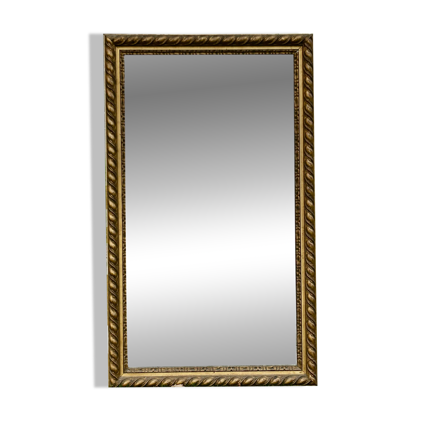 Large antique gilded mirror, wood and stucco gadroons, partially de-mercury