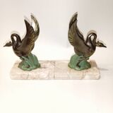 Art Deco bookends with metal swans, double patina and marble base.