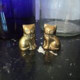 Pair of brass cats