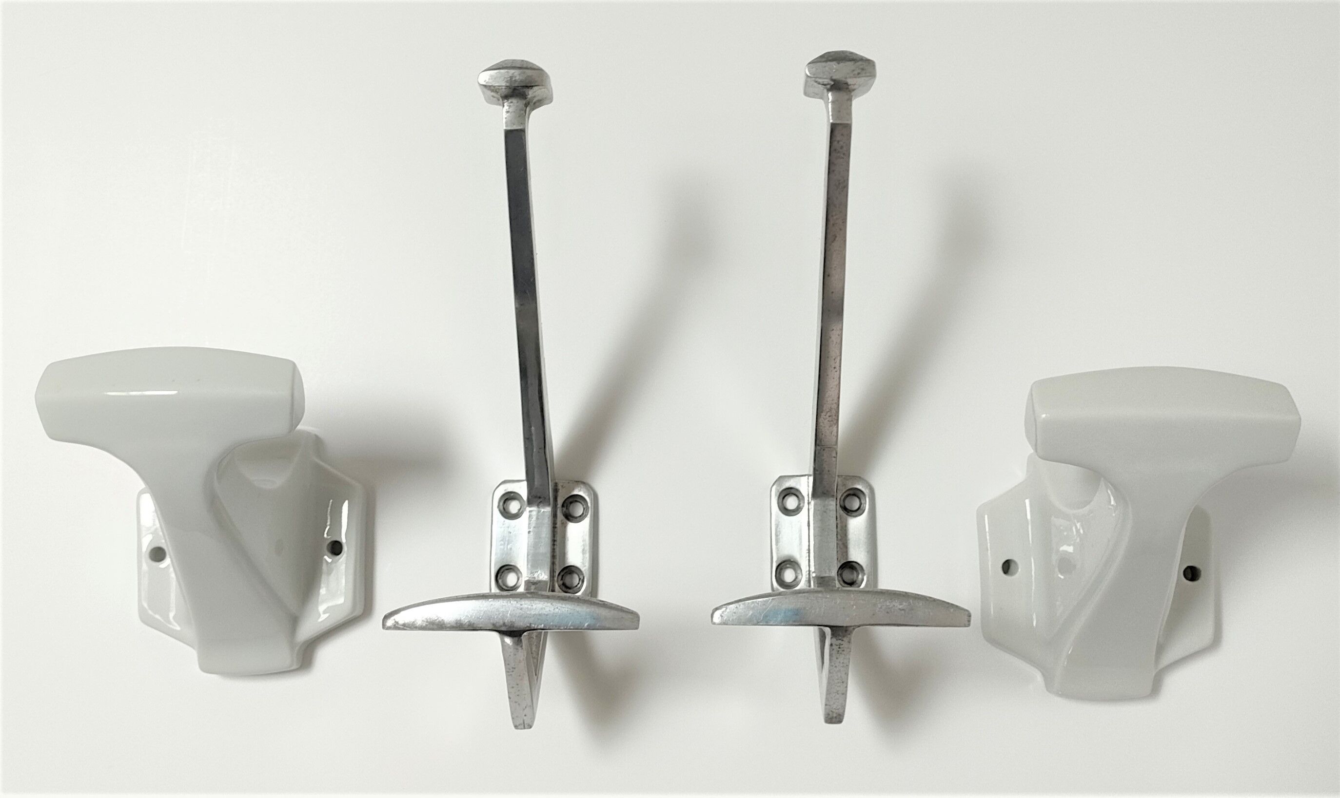 Four porcelain and vintage aluminum hooks