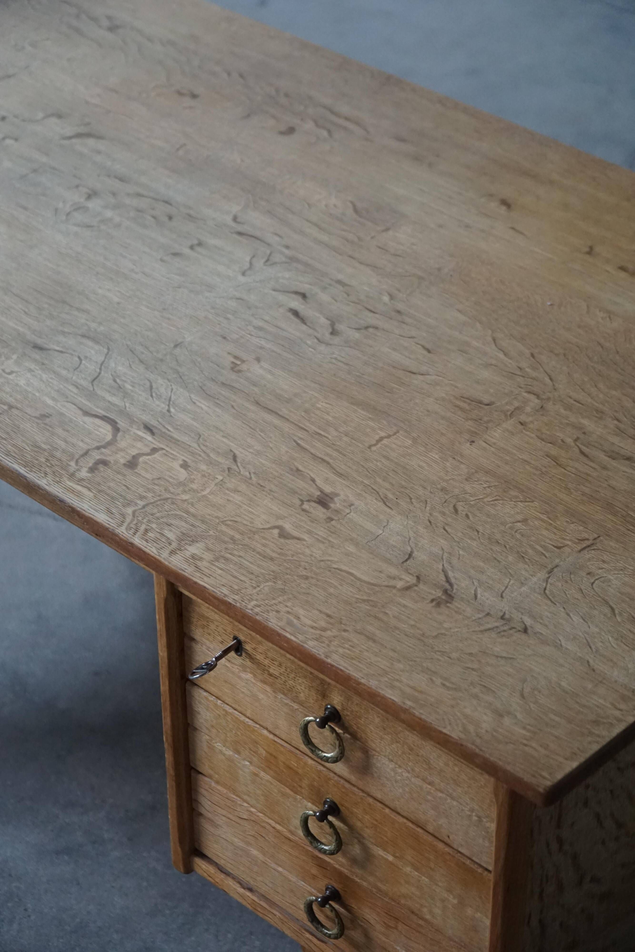 Free-standing oak desk by Henning Kjærnulf, mid-century Danish modernism, 1950s.