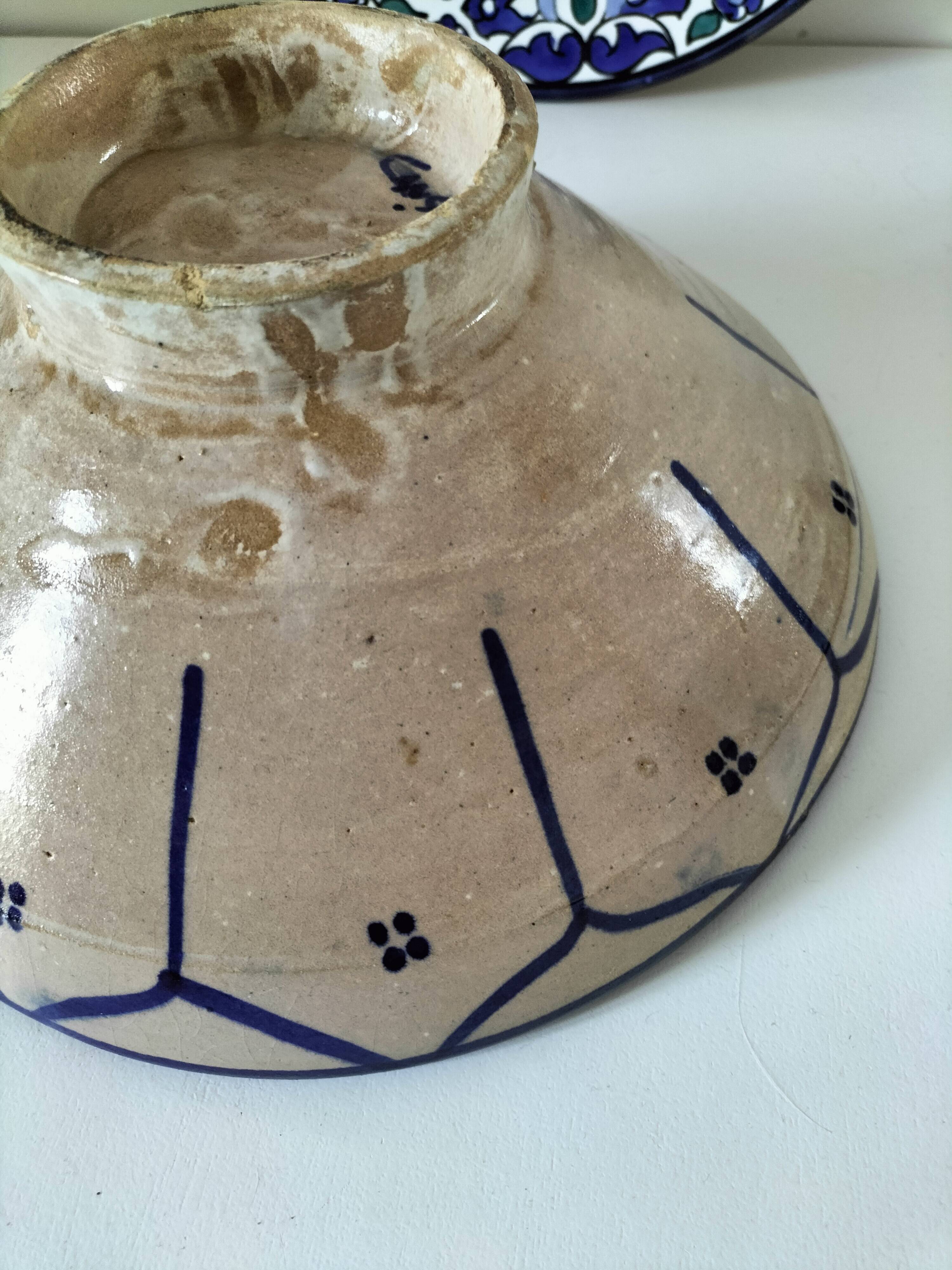 Set of 9 hand-painted Tunisian ceramics.